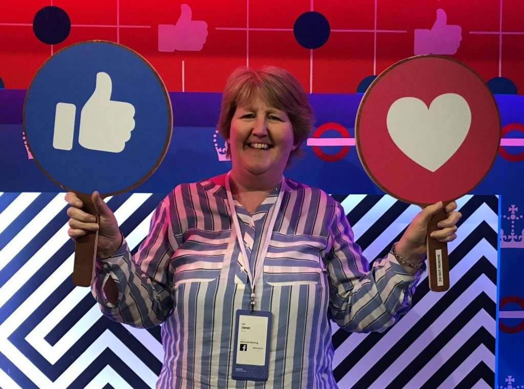 Janet at Facebook, London with reaction paddles